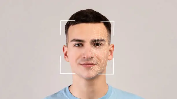 Photo of Smiling young caucasian male, double exposure with id scan, isolated on light background