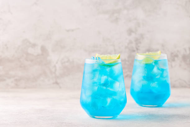 istock Refreshing blue drink or cocktail with ice 1352869454