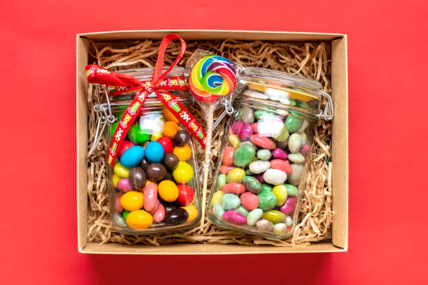 istock Handmade care package, seasonal gift box with candies, gingerbread, xmas decor Personalized eco friendly basket for family, friends, girl for thanksgiving, Christmas, mothers, fathers day Flat lay 1352869578
