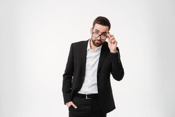 istock Serious young bearded businessman wearing glasses 1352874878