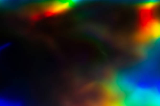 istock colorful rainbow crystal light leaks on black background 1352877444