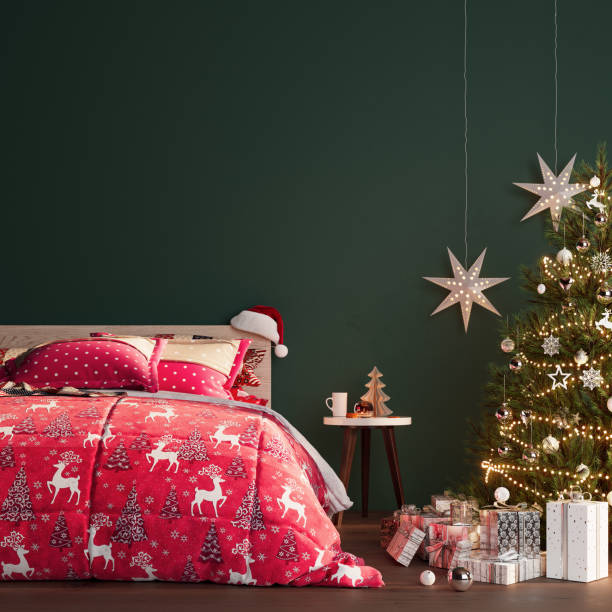 interno della camera da letto di natale con albero di natale e decorazione - red bed foto e immagini stock