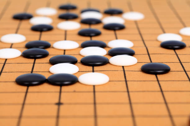 istock chinese game go,  Gobang and go game board 1352882730