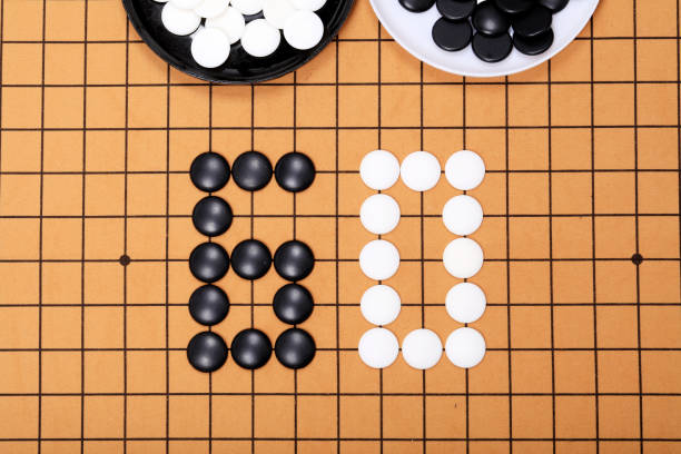 istock chinese game go,  Gobang and go game board 1352882822