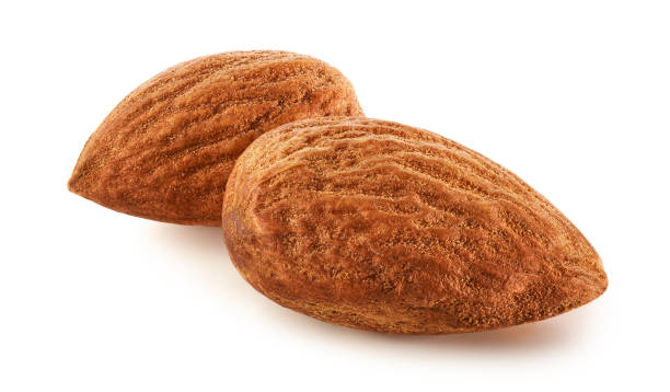 istock Nuts and raisins isolated on white background 1352883902