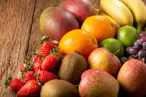 istock Assortment of fresh fruits on the table. 1352884132