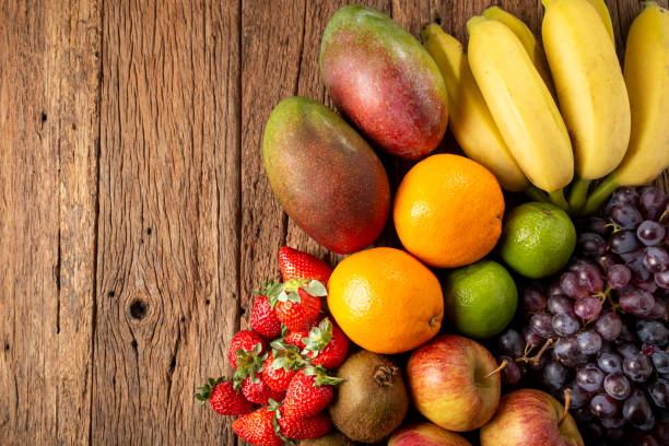 istock Assortment of fresh fruits on the table. 1352884134