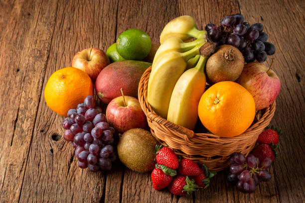 istock Assortment of fresh fruits on the table. 1352884155