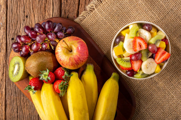 istock Fruit salad in bowl on the table. 1352885393