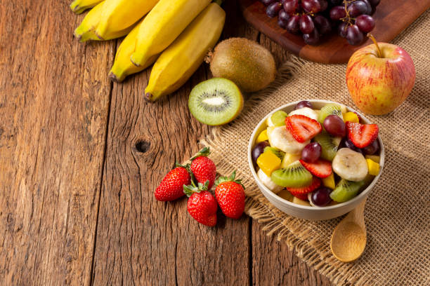 istock Fruit salad in bowl on the table. 1352885750