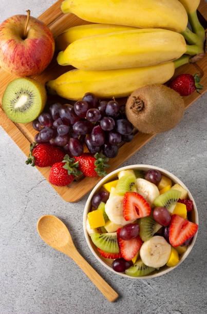 istock Fruit salad in bowl on the table. 1352886686
