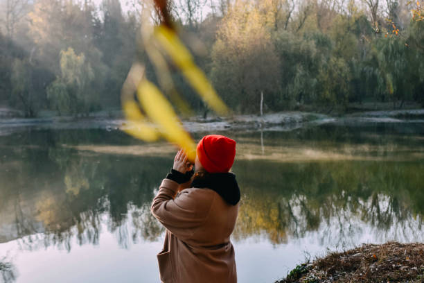 istock Woman sating on the morning park 1352888341