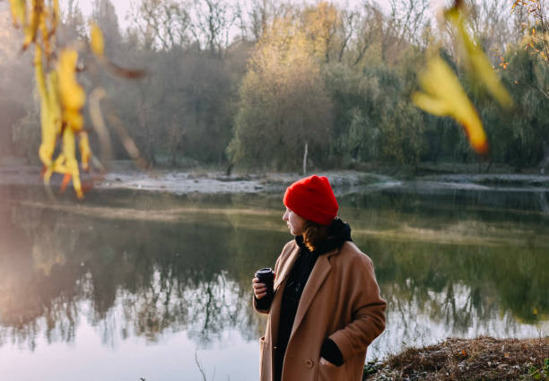 istock Woman sating on the morning park 1352888343