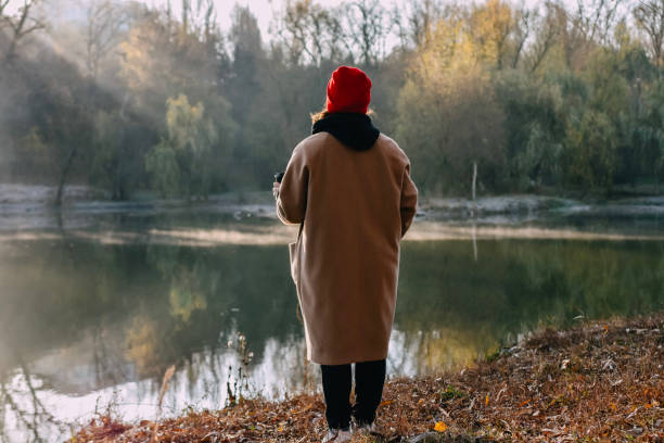 istock Woman sating on the morning park 1352888345