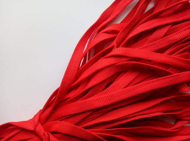istock bunch of red ribbons isolated on white 1352890262