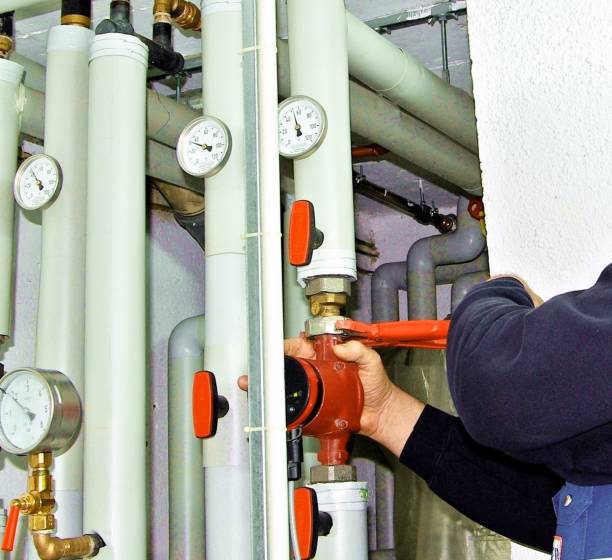 istock Heating emergency service, plumber repairing heating 1352891358