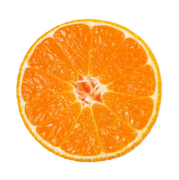 istock Tangerine fruit halves isolated on white background 1352892419