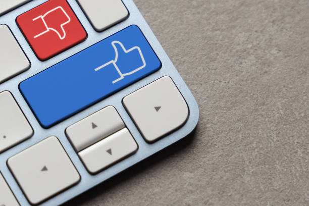 Like and dislike icons on computer keyboard