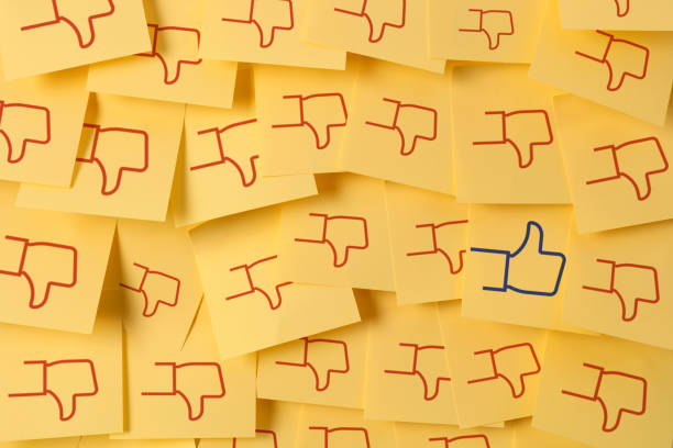 istock Like and dislike icons on adhesive note 1352893033