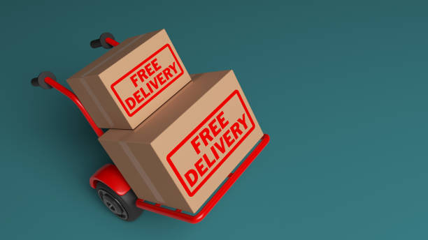 Red-colored Hand truck and cardboard box. Red-colored Hand truck and cardboard box. On a charcoal green-colored background. Horizontal composition with copy space. Isolated with clipping path. free shipping 3d stock pictures, royalty-free photos & images