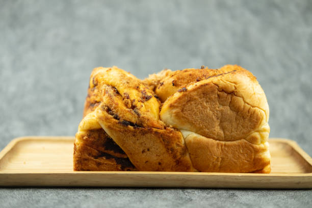 istock Bread with dried shredded pork and Thai chili paste served on wood tray 1352896637