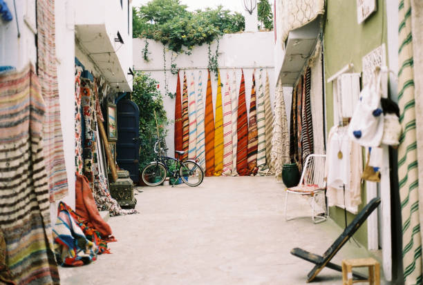 Colorful Blankets and Rugs Hanging in Asilah, Morocco