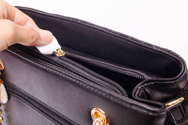 istock Black female handbag isolated on white background 1352898782