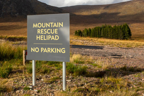 Mountain Rescue Helipad in the Scottish Highlands, UK A sign for the Mountain Rescue Helipad, in the glencoe area of the Scottish Highlands, UK. etive river photos stock pictures, royalty-free photos & images