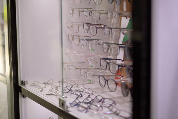 istock Optical shop with variety of eyeglasses frame displayed on shel 1352901535