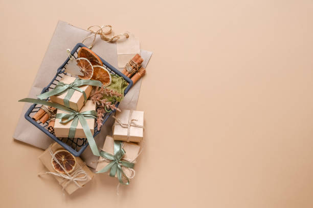 istock Christmas gift. gift box,zero waste, eco friendly hand made box packaging gifts in kraft paper table, eco christmas holiday concept, Christmas gift wrapping,eco decor banner 1352906850