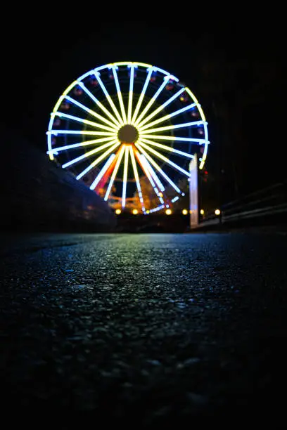 Colorful fun park wheel in Athens, Greece