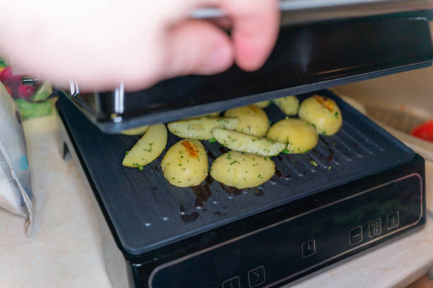 istock potato slices made on the electric grill 1352908980