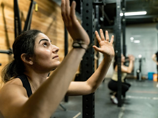 istock Women exercising in the Gym 1352909499