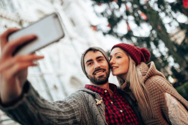 taking a selfie together in the street