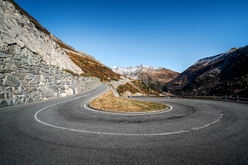 winding mountain road at the Grimsel Pass, Alps Mountains, Switzerland