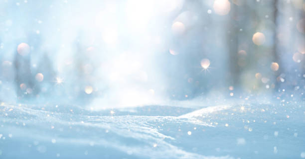 istock Winter Landscape with Snowflakes and Bright Bokeh 1352912390