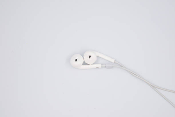 istock white earphones isolated on white background with clipping path 1352912860