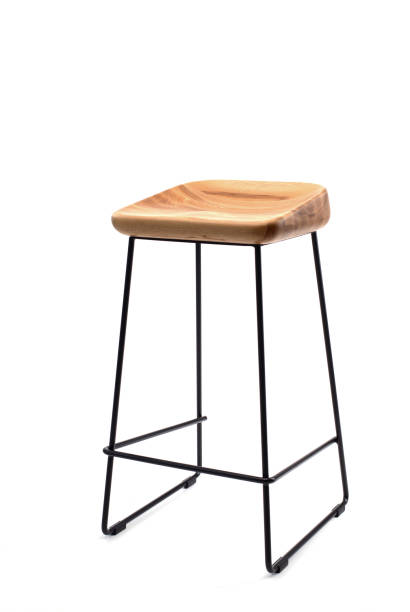 istock Steel frame high bar stool with a wooden seat. Loft style interior 1352913862