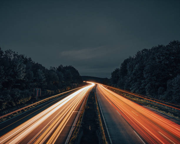 istock Long exposure of a freeway in Germany at night. 1352918448