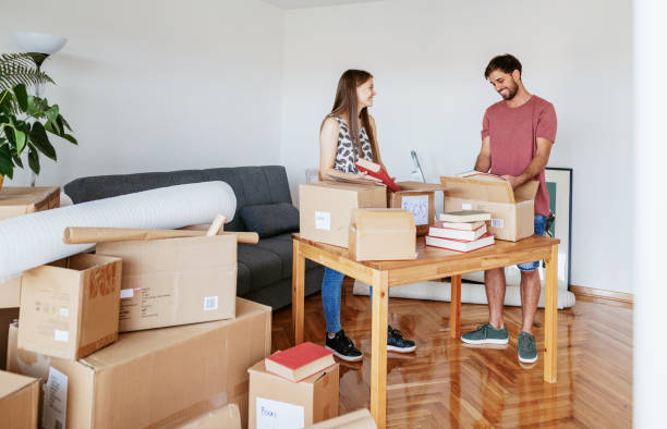 istock Couple moving in new apartment 1352918884