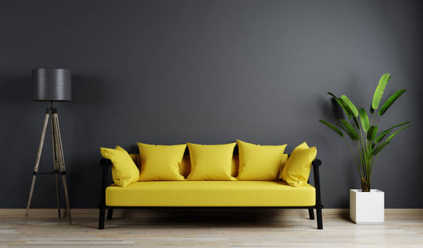 istock Home interior, luxury modern dark living room interior, black empty wall mock up, yellow 3d rendering 1352920025