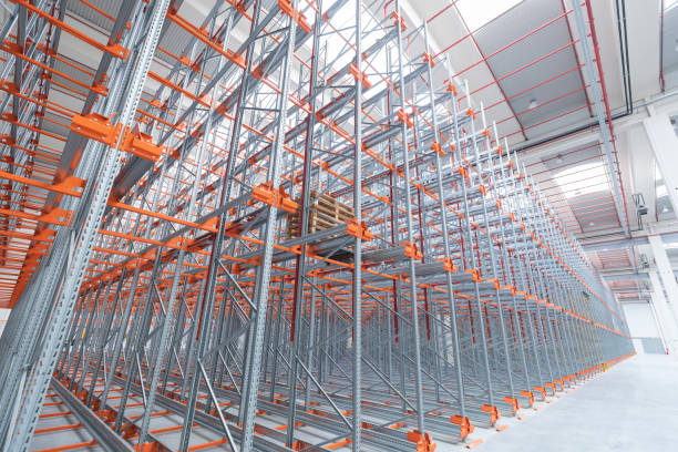 istock Industrial construction and roof in an empty warehouse 1352921458