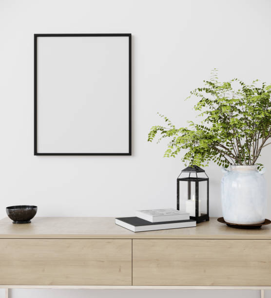 istock mockup poster frame in modern interior background with plant, Scandinavian style, 3D render, 3D illustration 1352923780