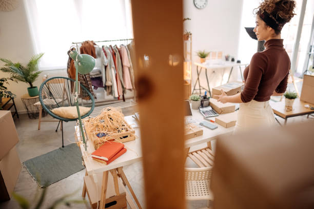 istock Woman getting ready the shipping packages 1352926750