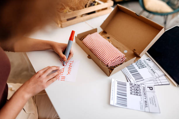 istock Woman getting ready the shipping packages 1352926784