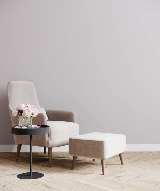 istock Bright minimalistic empty room interior design with luxury pink chair and light gray wall, empty room mock up, 3d rendering 1352931575