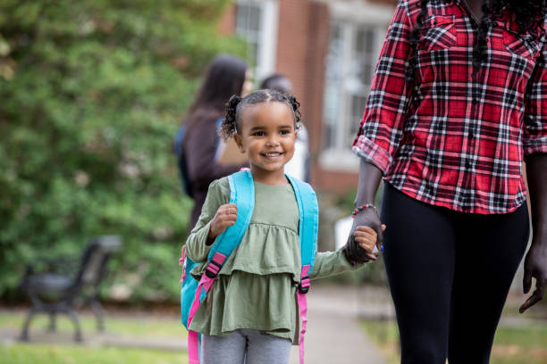 istock Mother walking Daughter to class 1352936580