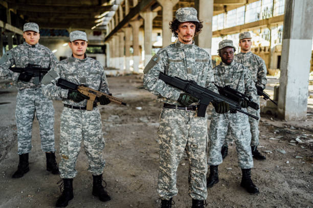 istock Soldiers with shotguns 1352938130