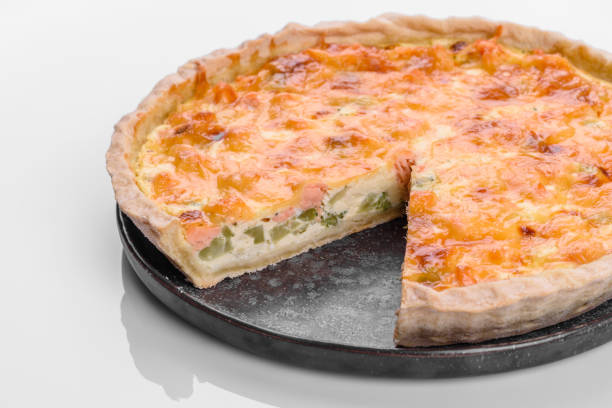 istock Delicious fresh quiche with broccoli, salmon and cheese 1352941871