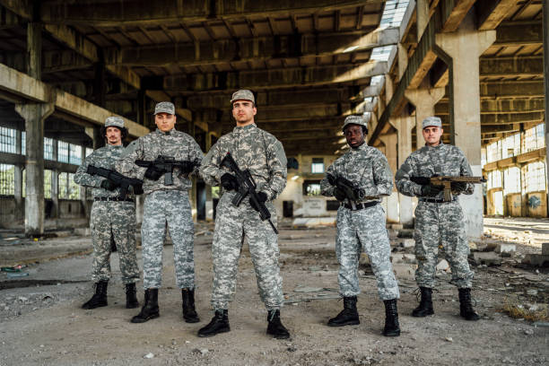 istock Soldiers with shotguns 1352942153